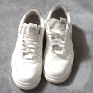Nike Air Force One woman's size 9 white with leopard print on Nike symbol